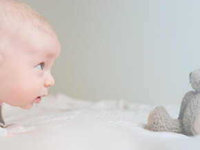 Tummy time helps your baby develop muscles and motor skills. Tummy time helps your baby develop muscles and motor skills.