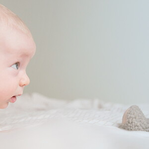 Tummy time helps your baby develop muscles and motor skills. Tummy time helps your baby develop muscles and motor skills.
